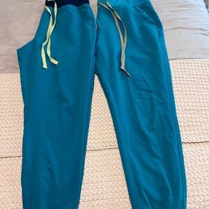 Multiple Teal color Fig brand scrubs